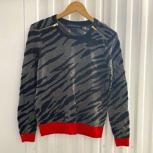 Black and Gold Knit Sweater with Red Trim and Gold Zippers